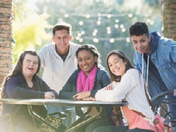 A group of people in a park together.