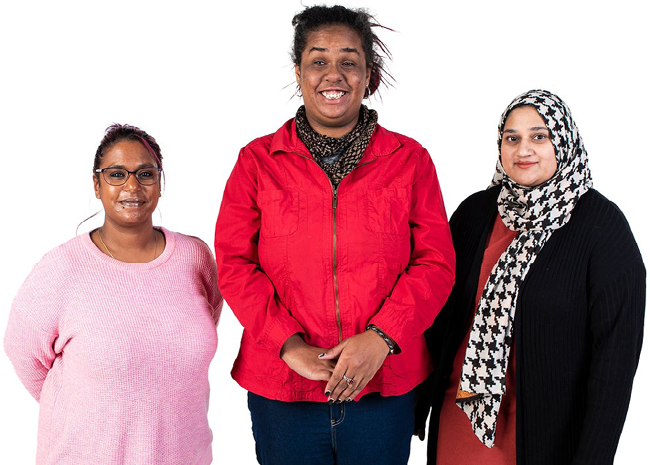 3 people smiling for a photo. Some of them have disability.